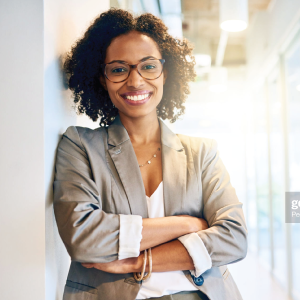 Woman with arms folded smiling 